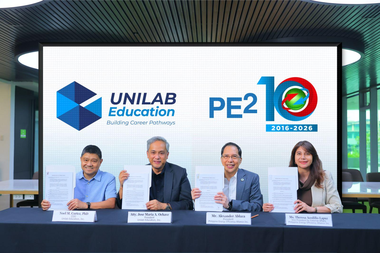 Unilab Education (UniEd) and PE2 representatives display the signed Memorandum of Understanding signed on 14 May 2026. From left: UniEd COO Noel M. Cortez, UniEd President Atty. Jose Maria A. Ochave, PE2 President Alexander Ablaza and PE2 Vice President for External Affairs Theresa Acedillo- Lapuz. (Photo: UniEd)